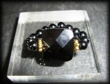 FACETED ONYX RING ( 6gr/elastic)