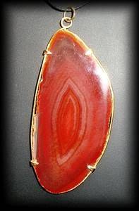 PENDENTIF AGATE ORANGE CERCLEE (20gr/7.4cm)