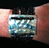 BRACELET NACRE+ONYX(36gr/élastique)