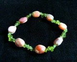 BRACELET OPALE ROSE FACETTEE+PERIDOT(12gr/élastique)