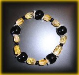 BRACELET CITRINE FACETTEE+ONYX(22gr/élastique)