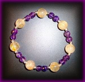 BRACELET QUARTZ RUTILE+AMETHYSTE(20gr/élastique)